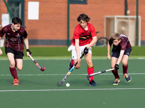 SMC boy playing hockey