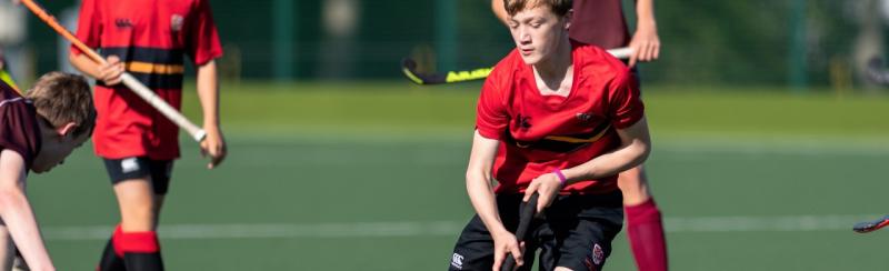SMC boy playing hockey