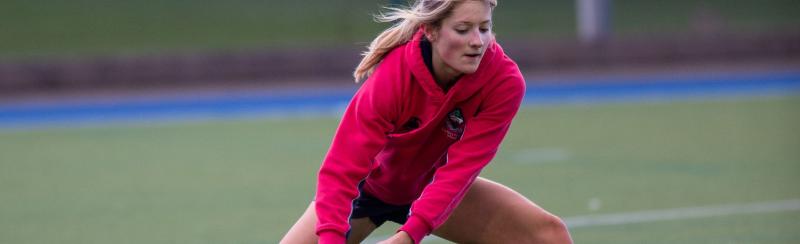 MES girl playing hockey